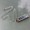 Crescendo Music Mini Harmonica On Necklace